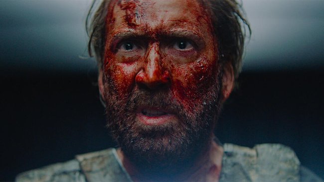 Nicolas Cage mit blutverschmiertem Gesicht. Nicolas Cage mit blutverschmiertem Gesicht.